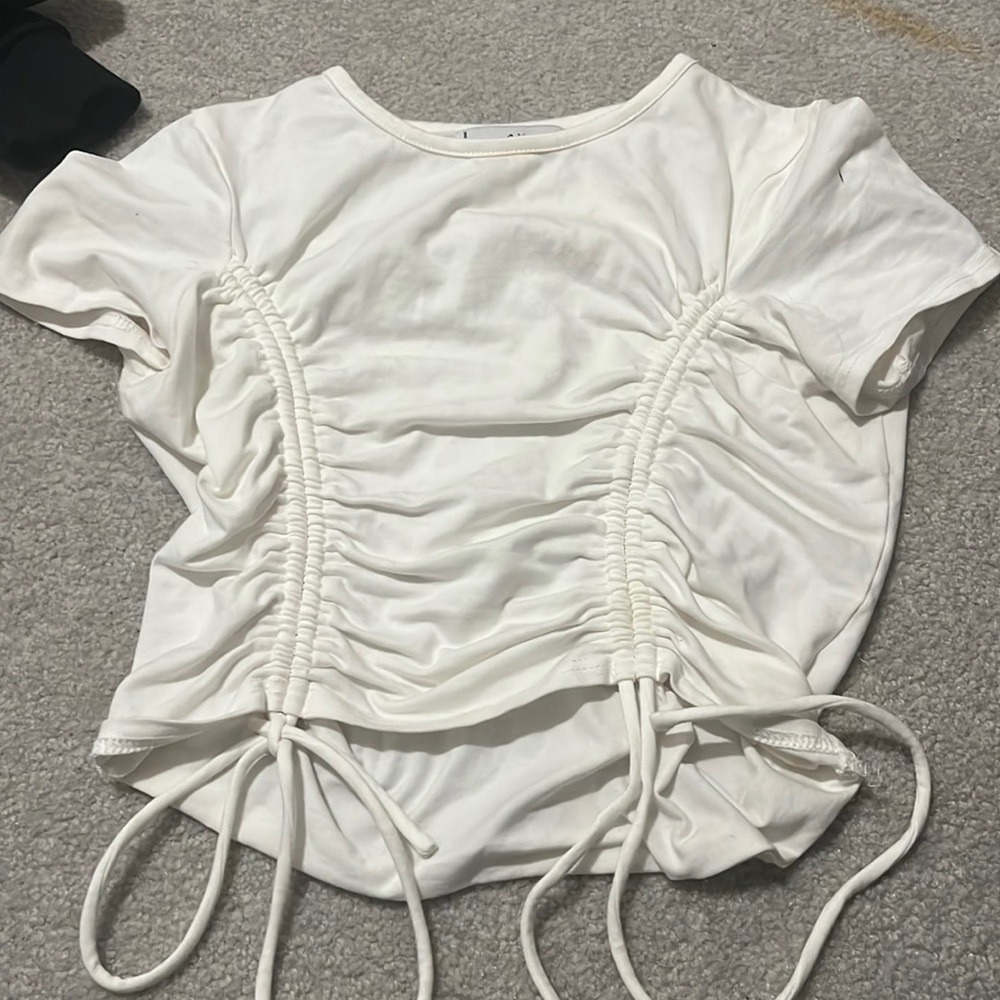 White Adika cropped shirt with cinching on the front